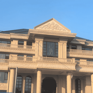 乌海黄金麻别墅外墙干挂石材效果示例