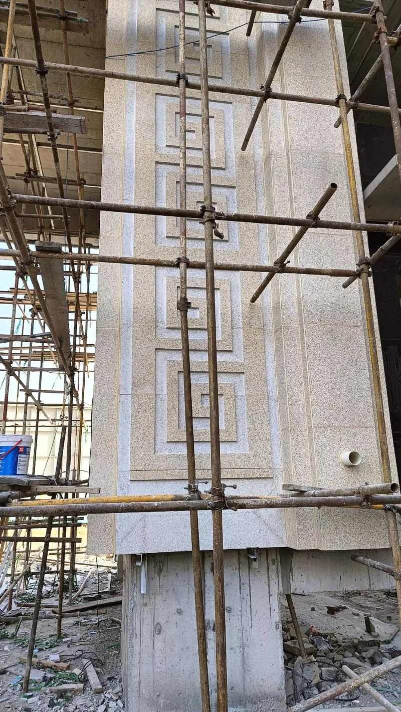 乌海 黄金麻花岗岩别墅外墙干挂回纹造型效果